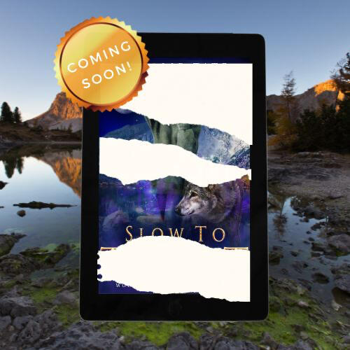 A smiling woman in a blue denim shirt is texting on a white phone.